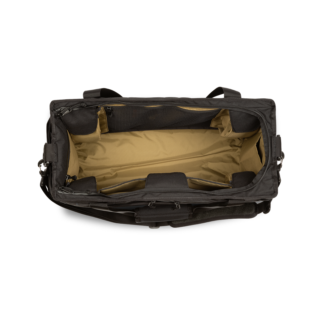 45L Mission Hauler Tote (Covert Black) with main compartment open showing Coyote interior and pockets on a white background / Covert Black
