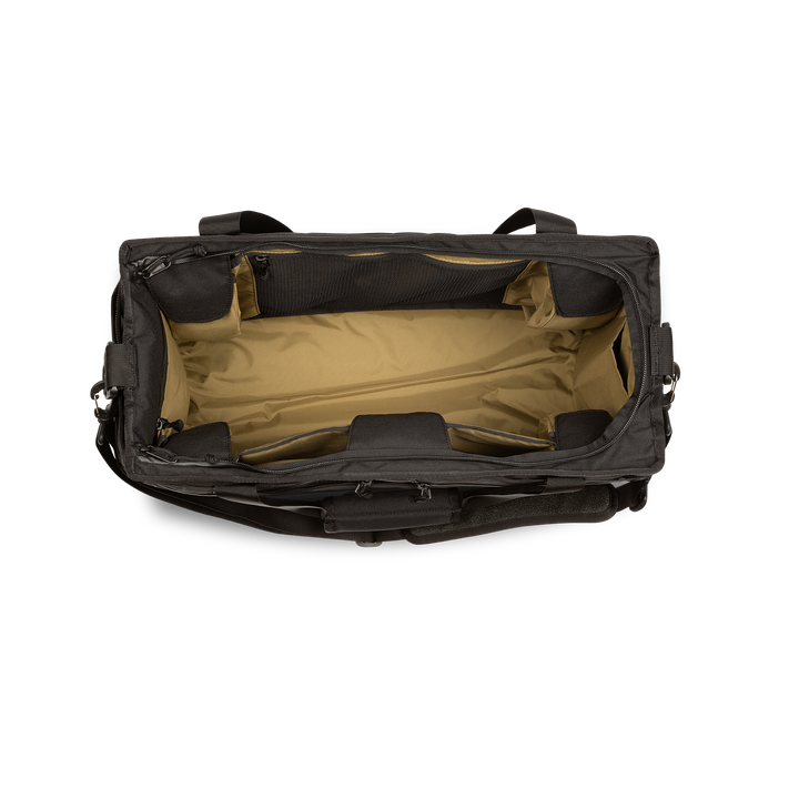 45L Mission Hauler Tote (Covert Black) with main compartment open showing Coyote interior and pockets on a white background / Covert Black