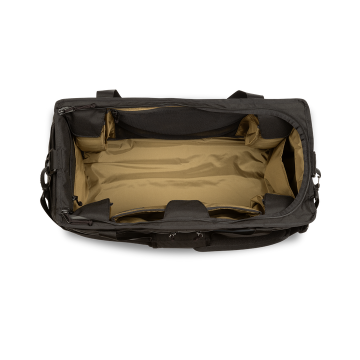 58L Mission Hauler Tote (Covert Black) with main compartment open showing Coyote interior and pockets on a white background / Covert Black