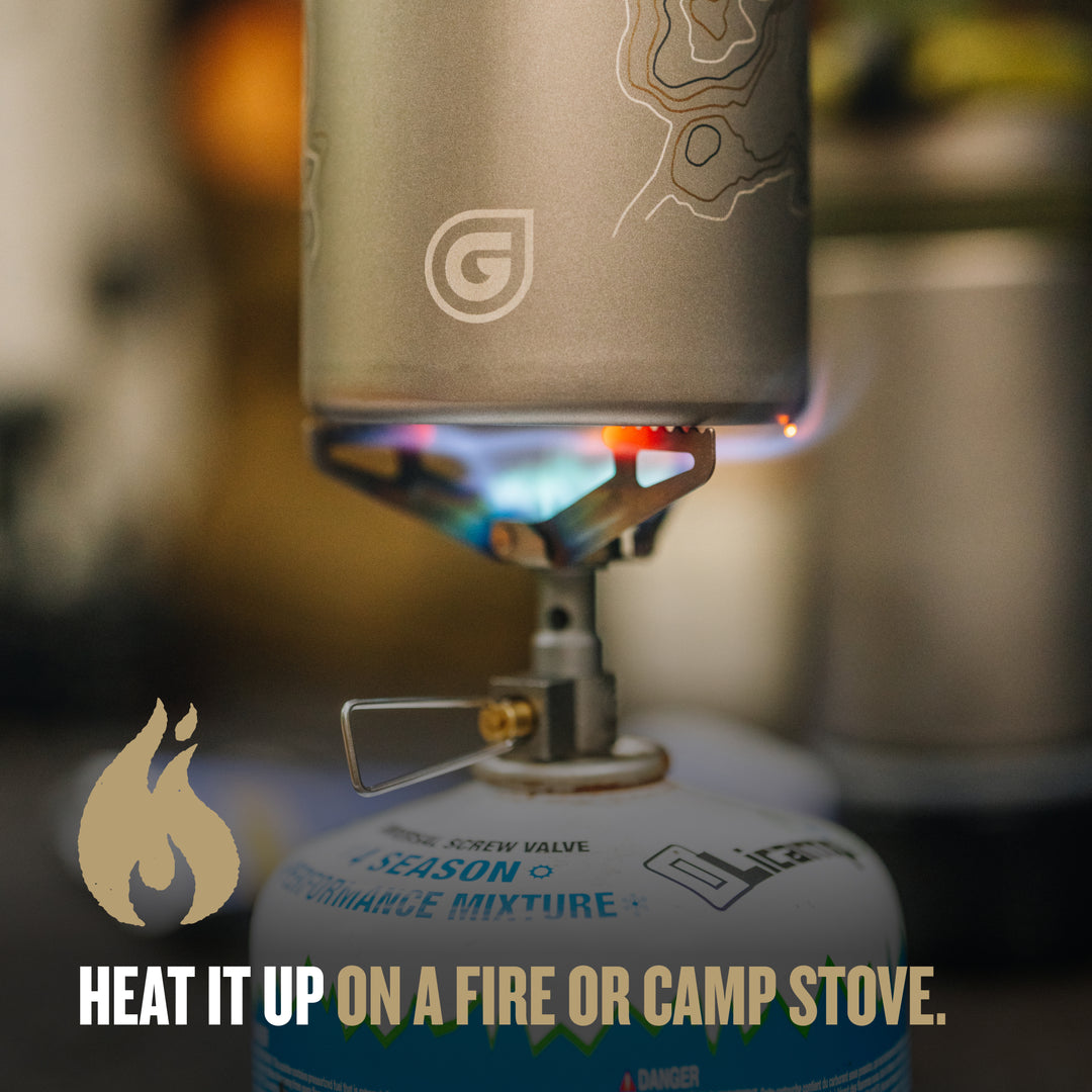 Heat up water on a fire or camp stove with the GeoPress® Titanium Outer Cup / Standard / Plus Cook Lid / Covert Black / Olive Drab / Coyote Brown