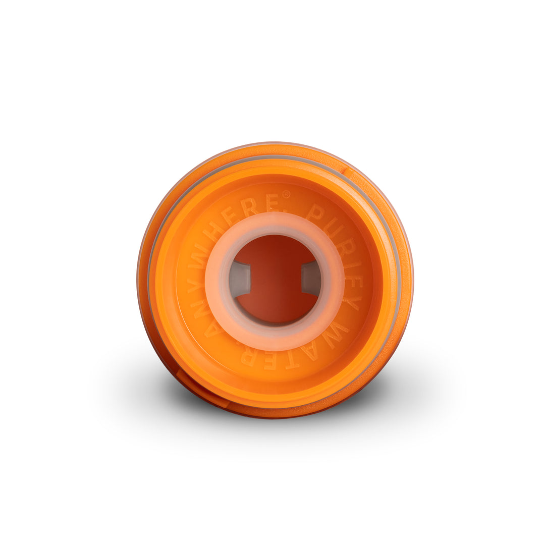 Grayl UltraPress Replacement Filter and Purifier Cartridge • One-Way Drink Mix &amp; Electrolyte Valve • Above View / Orange / Valve